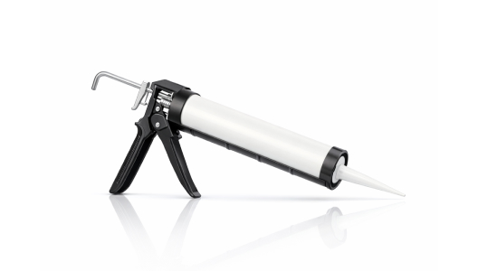 Air sealing with a caulking gun used to reduce air leaks and improve home energy efficiency.